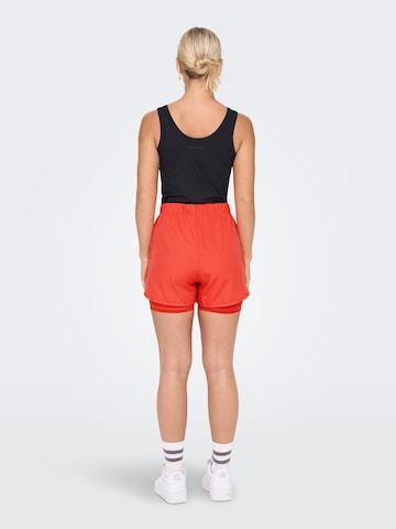 ONLY PLAY Loosefit Sportovní kalhoty – oranžová