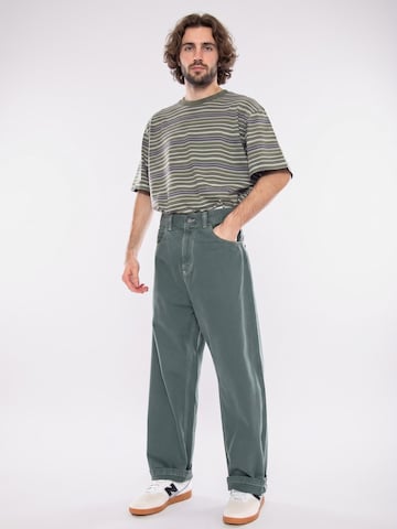 Carhartt WIP Baggy Jeans 'Brandon Pant Velvet Green' in Groen: voorkant