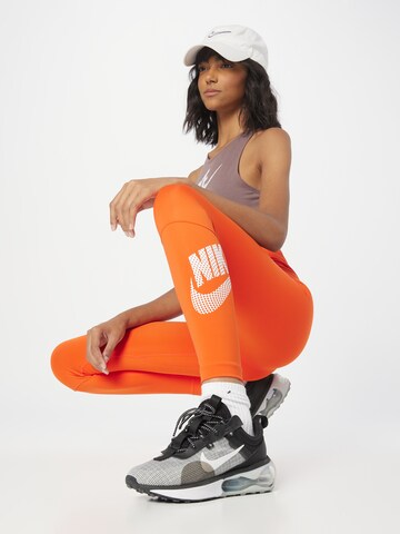 Skinny Pantaloni sport de la NIKE pe portocaliu