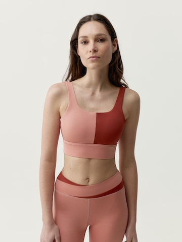 Bustier Soutien-gorge de sport 'Kate' Born Living Yoga en orange : devant