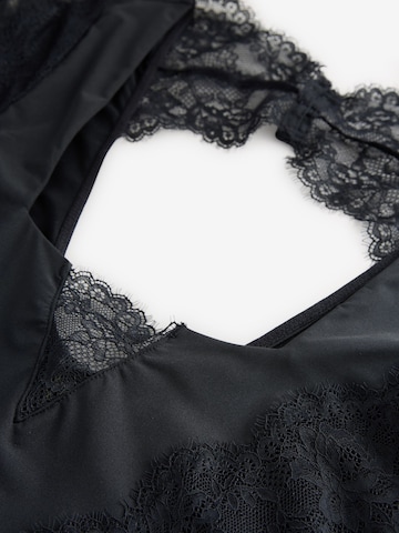 Lipsy Bodysuit in Black