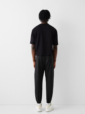 Bershka Tapered Pants in Black