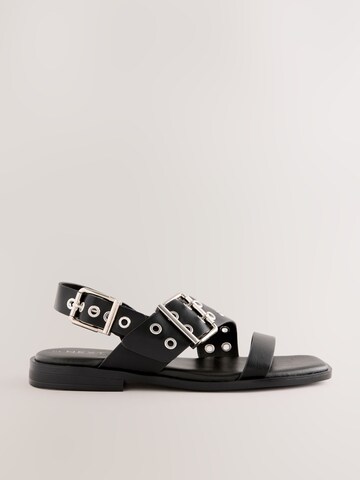 Next Remsandal i svart