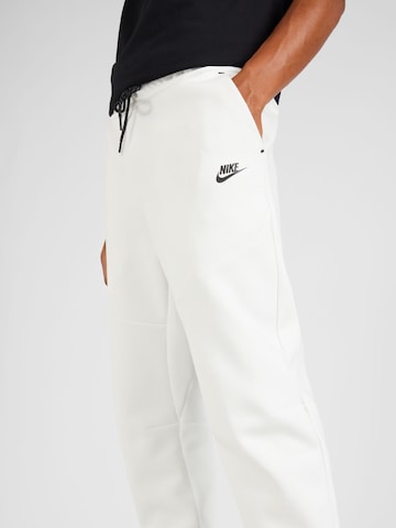 balta Nike Sportswear Siaurėjantis Kelnės