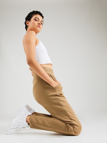 Athlecia Tapered Sports trousers in Brown