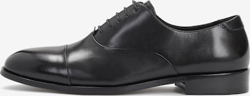 Kazar Lace-Up Shoes in Black: front