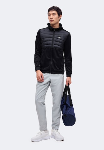 UNDER ARMOUR - Chaqueta deportiva 'AF' en negro: frente