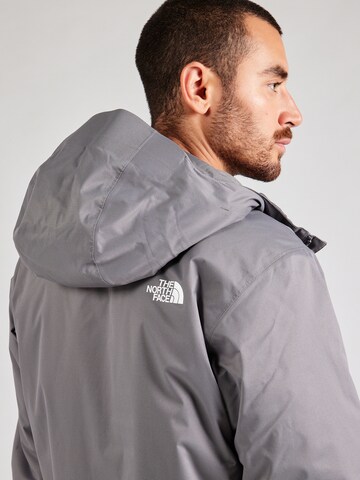 THE NORTH FACE Regular fit Kültéri kabátok 'Quest' - szürke