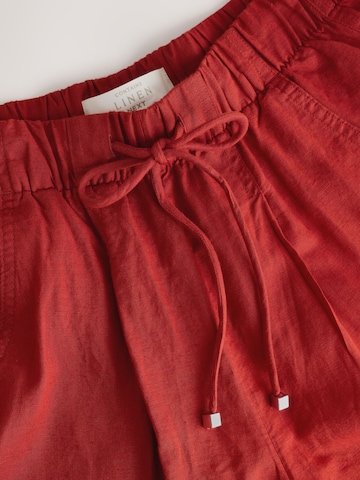 Barrel Pantaloni con pieghe di Next in rosso