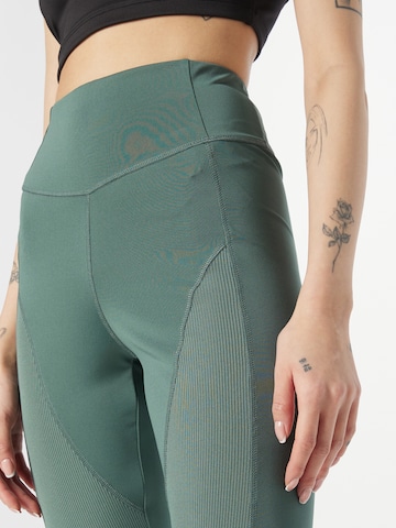 ABOUT YOU Skinny Športne hlače 'Lulu' | zelena barva