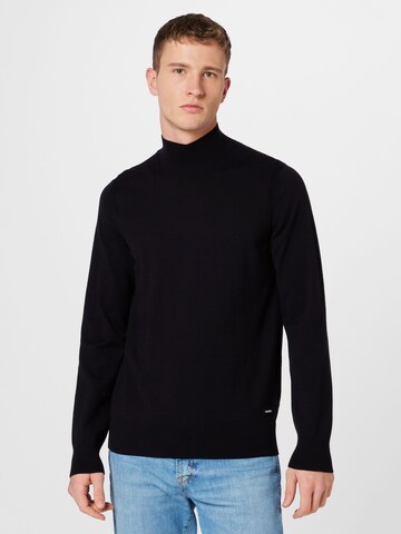 Pull-over Calvin Klein en noir : devant