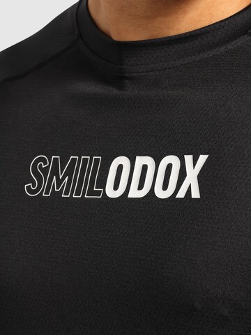Smilodox T-Shirt 'Powerfit Pro' in Schwarz
