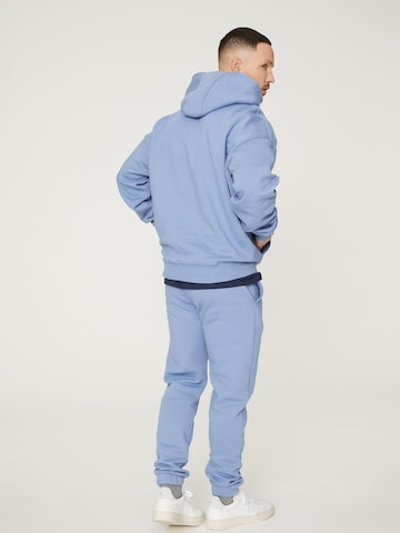 DAN FOX APPAREL Zwężany krój Spodnie 'Danilo' w kolorze niebieski