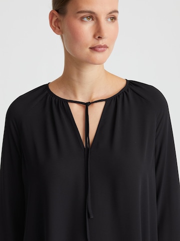 Minx Bluse‌‌ in Schwarz
