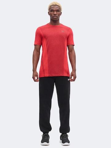 UNDER ARMOUR Tapered Sportbyxa i svart