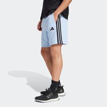 ADIDAS SPORTSWEAR Normalny krój Spodnie sportowe 'Essential' w kolorze niebieski: przód