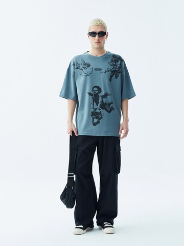 Tricou 'Rochester' de la VAMOS CLO pe albastru