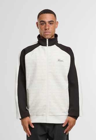 Veste de survêtement Karl Kani en blanc : devant