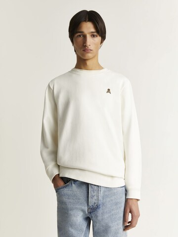 Sweat-shirt Scalpers en beige : devant