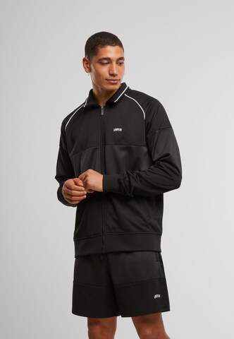 Unfair Athletics Between-season jacket 'Center Court Tracktop' in Black