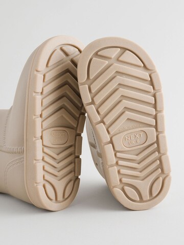 Next Kumisaappaat värissä beige