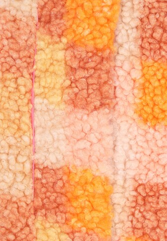 swirly Fleece jas in Oranje