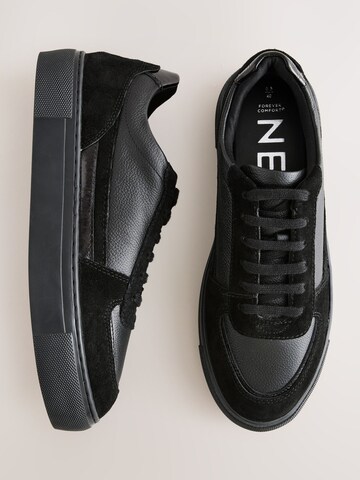 Baskets basses Next en noir