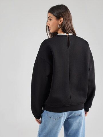 Sweat-shirt 'Willow' ABOUT YOU en noir