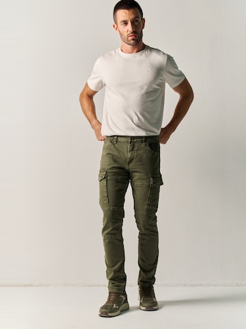 Tapered Jeans cargo di KOROSHI in verde