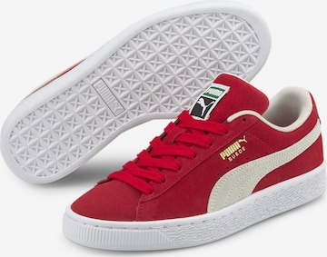 Baskets PUMA en rouge