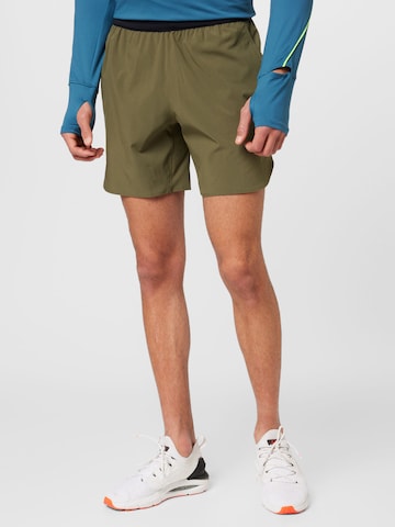 UNDER ARMOUR Regularen Športne hlače 'Peak' | zelena barva: sprednja stran