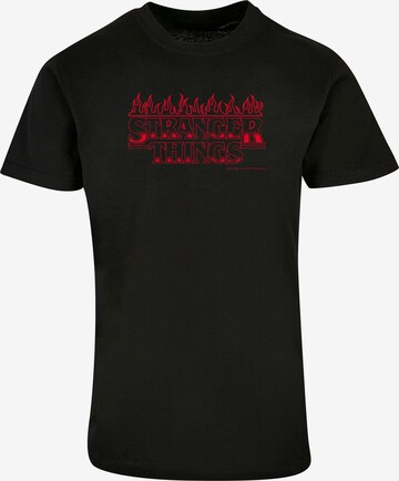 ABSOLUTE CULT T-Shirt 'Stranger Things - Flames' in Schwarz: predná strana
