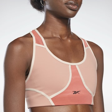 Bustino Reggiseno sportivo di Reebok in rosso