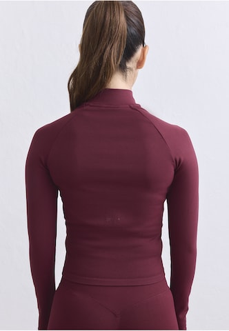 Veste de survêtement Aim'n en rouge