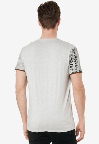 Rusty Neal T-Shirt mit lässigem Allover-Print in Grau
