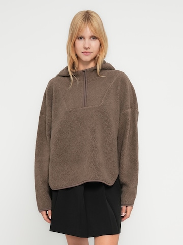 Noisy may Trui 'NMCOZY' in Bruin: voorkant