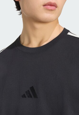 ADIDAS SPORTSWEAR - Camiseta funcional 'Kit' en negro