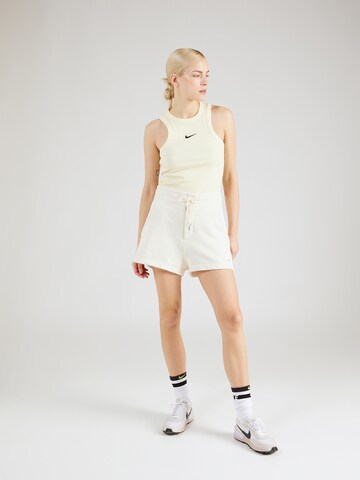 Nike Sportswear Обычный Штаны в Бежевый