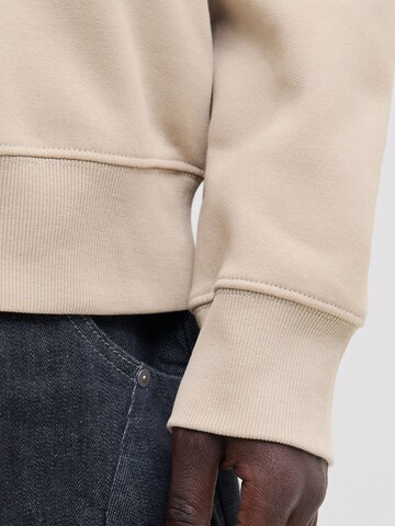 Sweat-shirt 'JJEACE' JACK & JONES en beige