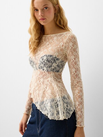 Maglietta di Bershka in beige