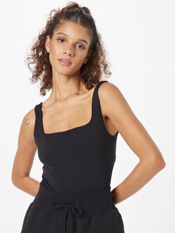 NIKE Sports Top 'LUXE' in Black: front