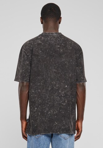 Karl Kani T-Shirt in Schwarz