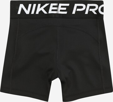 NIKE - Skinny Calças de desporto em preto