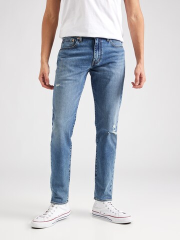 LEVI'S ® Tapered Jeans '512™' in Blue: front