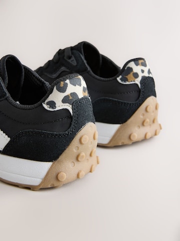 Baskets Next en noir