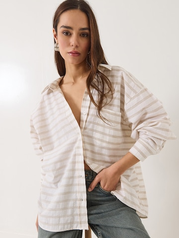 Chemisier Bianco Lucci en beige : devant