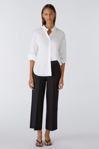 OUI Regular Pleat-front trousers in Black