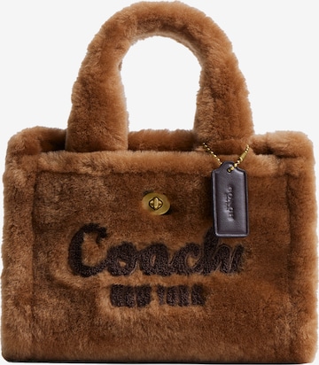 COACH Сумки в Коричневый: спереди