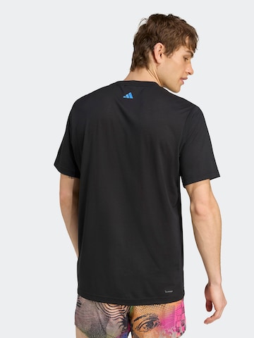 ADIDAS SPORTSWEAR Λειτουργικό μπλουζάκι 'Adidas x Jeremy Scott' σε μαύρο