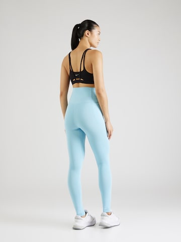 UNDER ARMOUR Skinny Workout Pants 'Meridian' in Blue